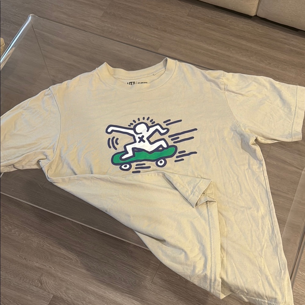 Cream UNIQLO Graphic T-Shirt with Skater Design